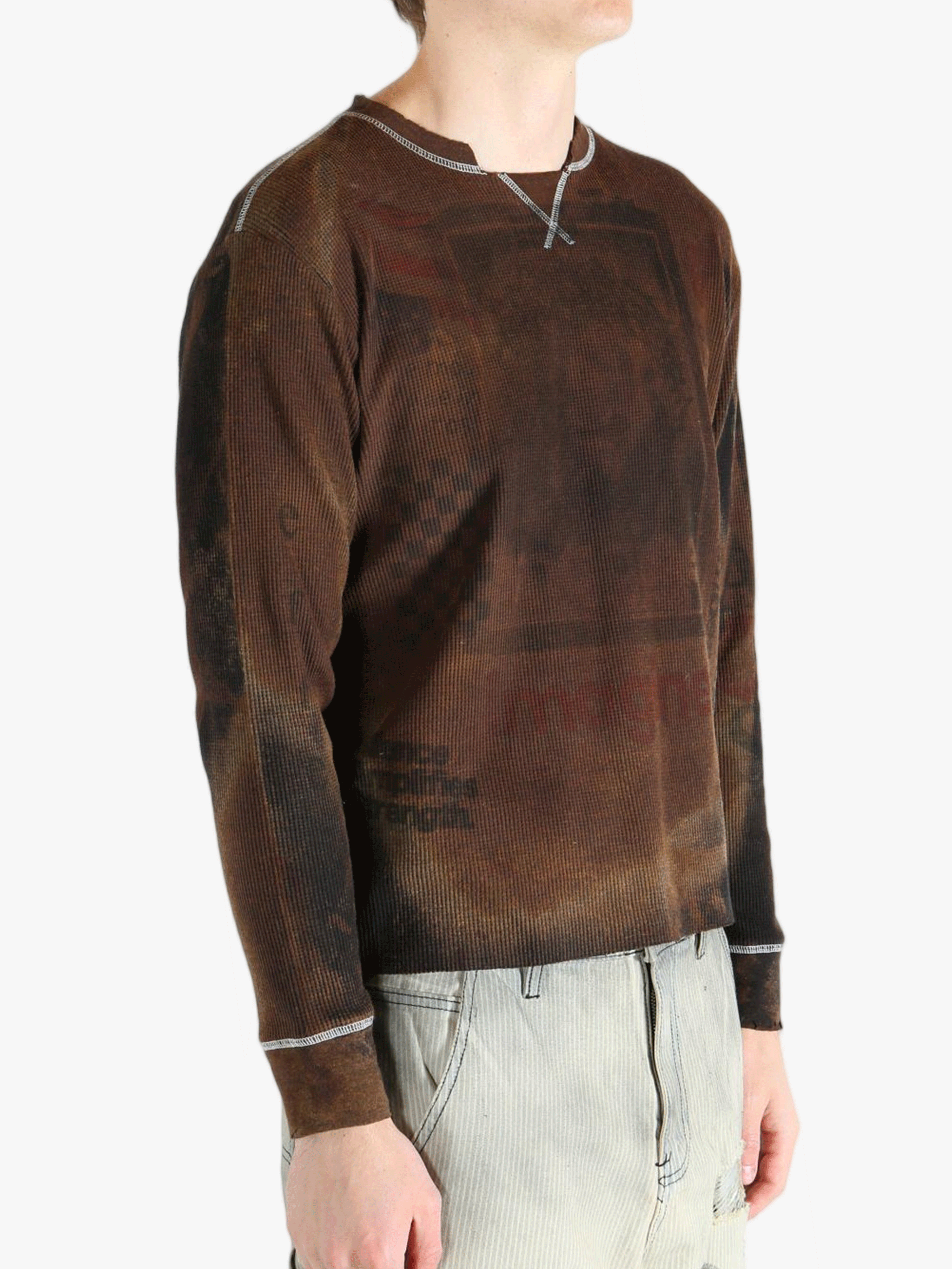 Brown shirts worn by a person, showing the shirts fit