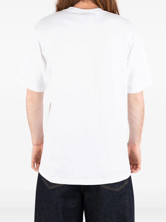white t-shirt worn by a person, showing the t-shirt fit