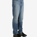 Blue jeans worn by a person, showing the jeans's fit