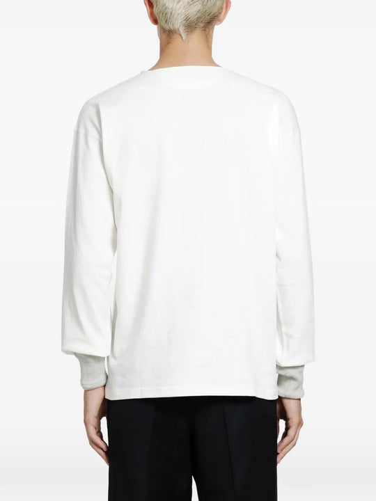 White top, full body view