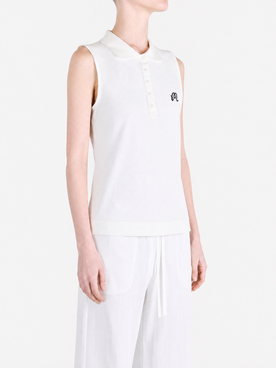 White top worn by a person, showing the top fit
