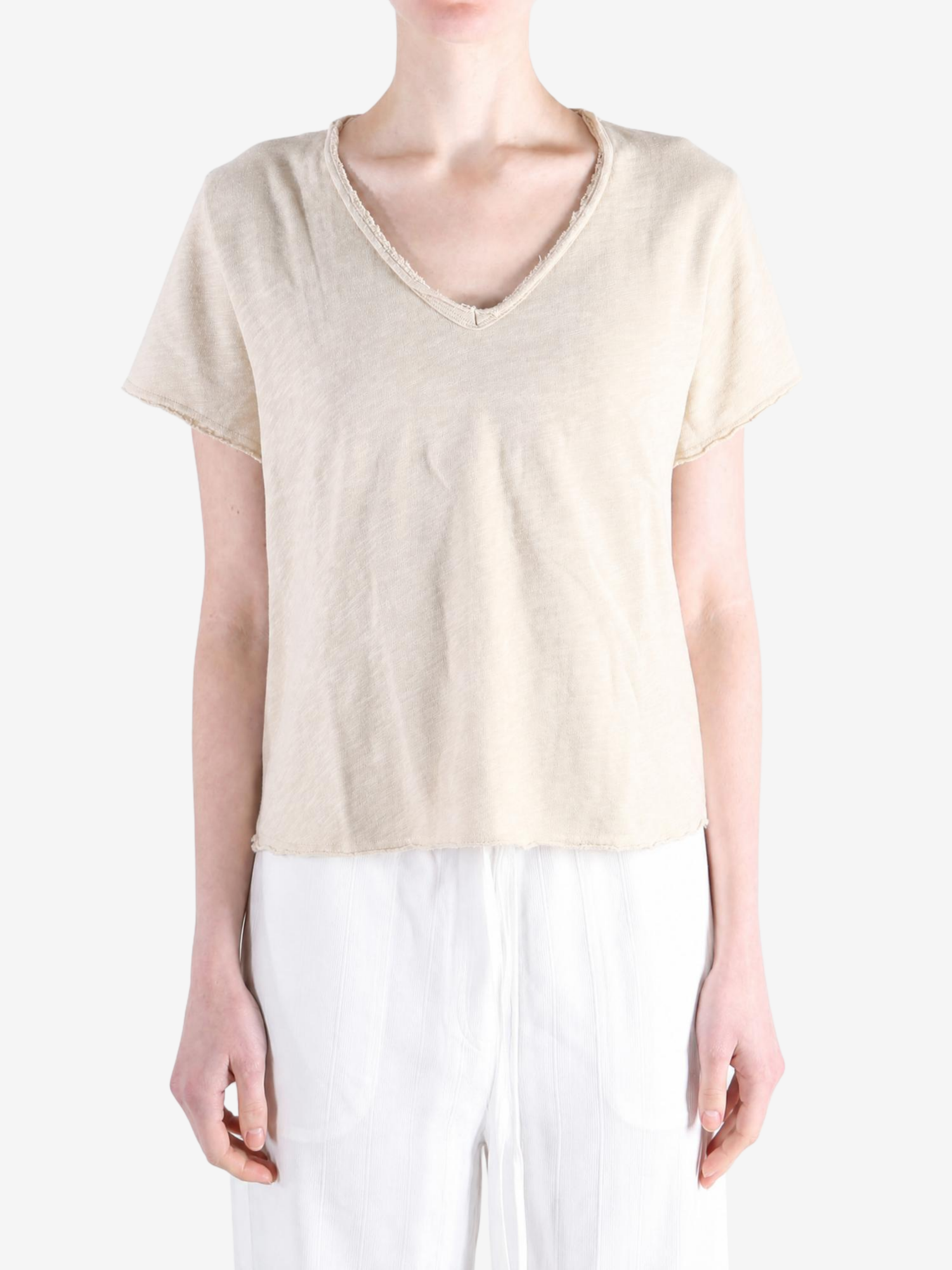 Tan t-shirt worn by a person, showing the t-shirt fit