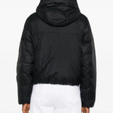 Black jacket worn by a person, showing the jacket's fit