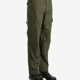 Green pants worn by a person, showing the pants's fit