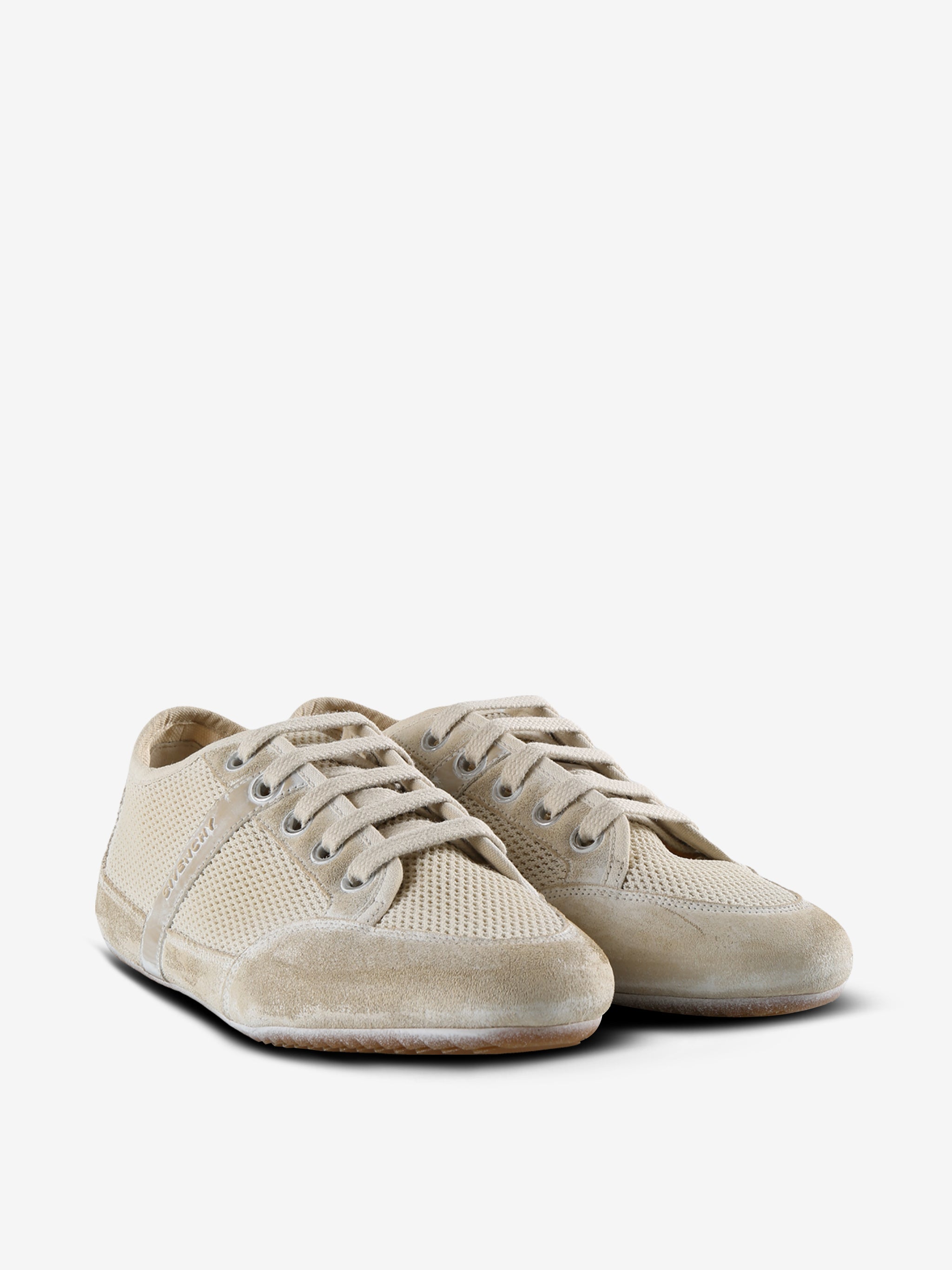 Tan sneakers, side view