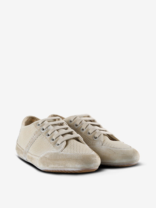 Tan sneakers, side view