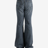 Blue pants worn by a person, showing the pants's fit