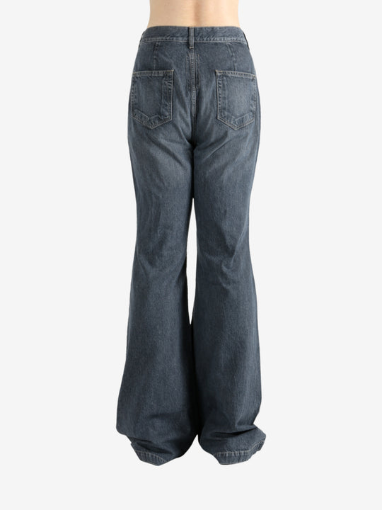 Blue pants worn by a person, showing the pants's fit