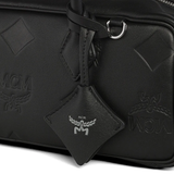 Close up of black bag, showing texture of the calf leather fabric