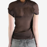 brown top worn by a person, showing the top fit