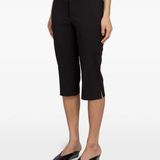Brown pants worn by a person, showing the pants' fit