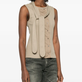 Tan top worn by a person, showing the top fit