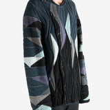 Black top worn by a person, showing the top's fit