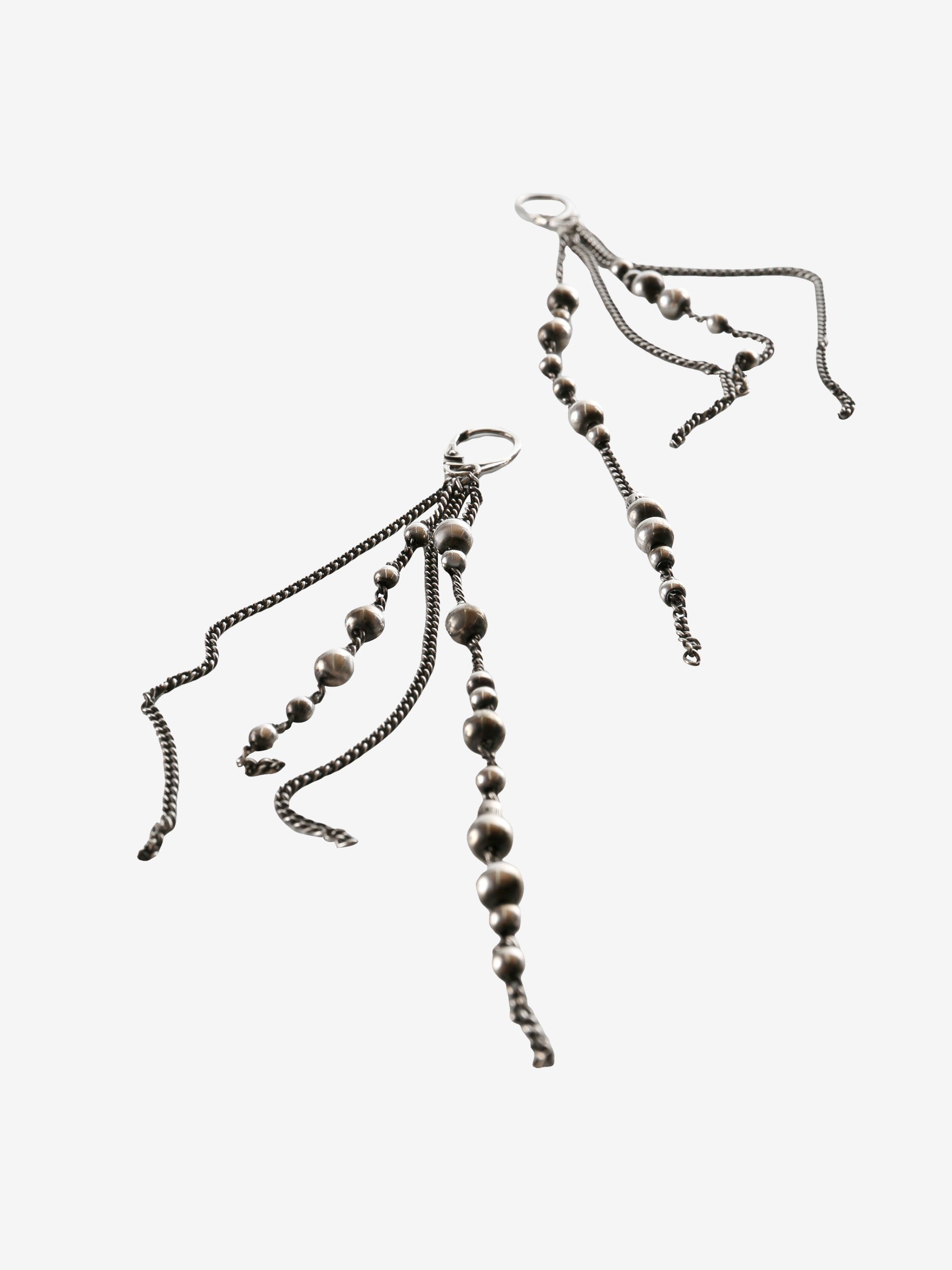 silver earrings, back view