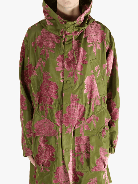 green jackets-coats worn by a person, showing the jackets-coats fit