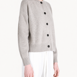 Grey knitwear worn by a person, showing the knitwear fit