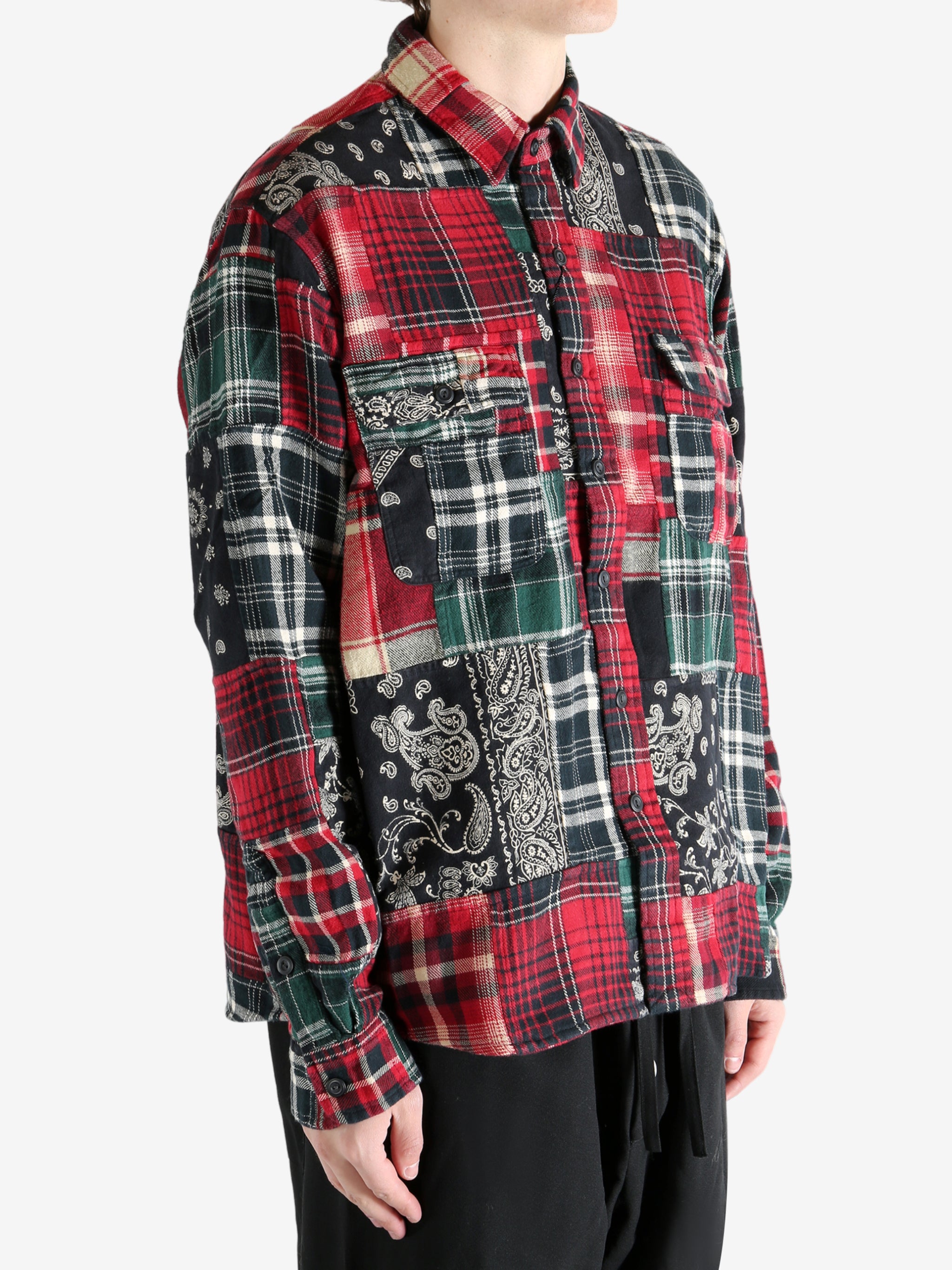 Red shirts worn by a person, showing the shirts fit