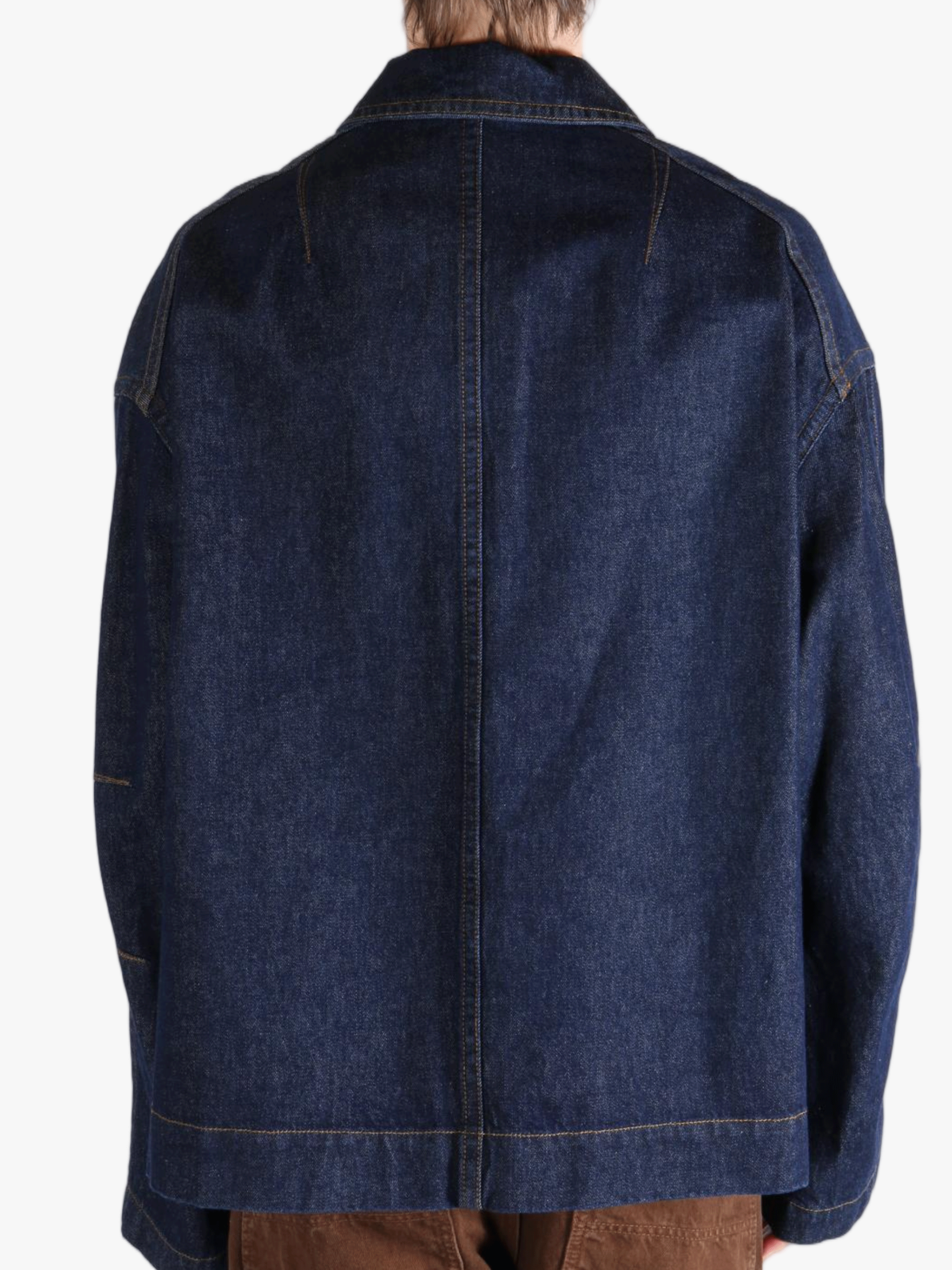 Navy jacket worn by a person, showing the jacket's fit