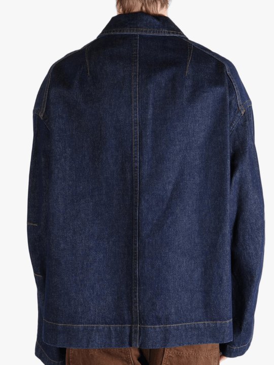 Navy jacket worn by a person, showing the jacket's fit