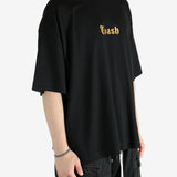 Black t-shirt worn by a person, showing the shirt's fit