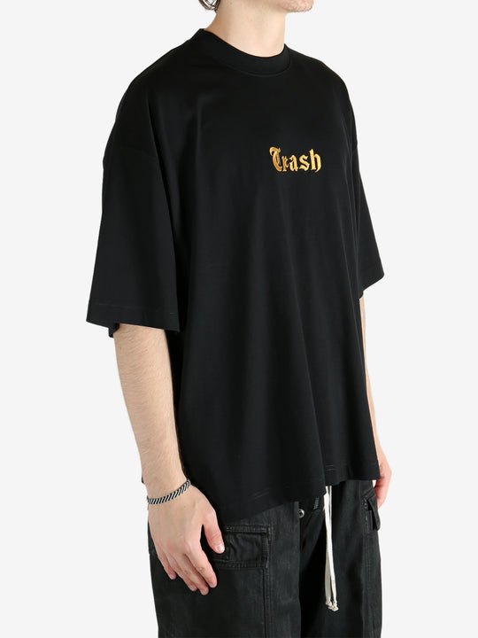 Black t-shirt worn by a person, showing the shirt's fit