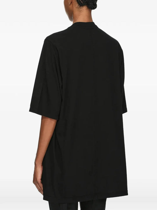 Black t-shirt worn by a person, showing the t-shirt fit