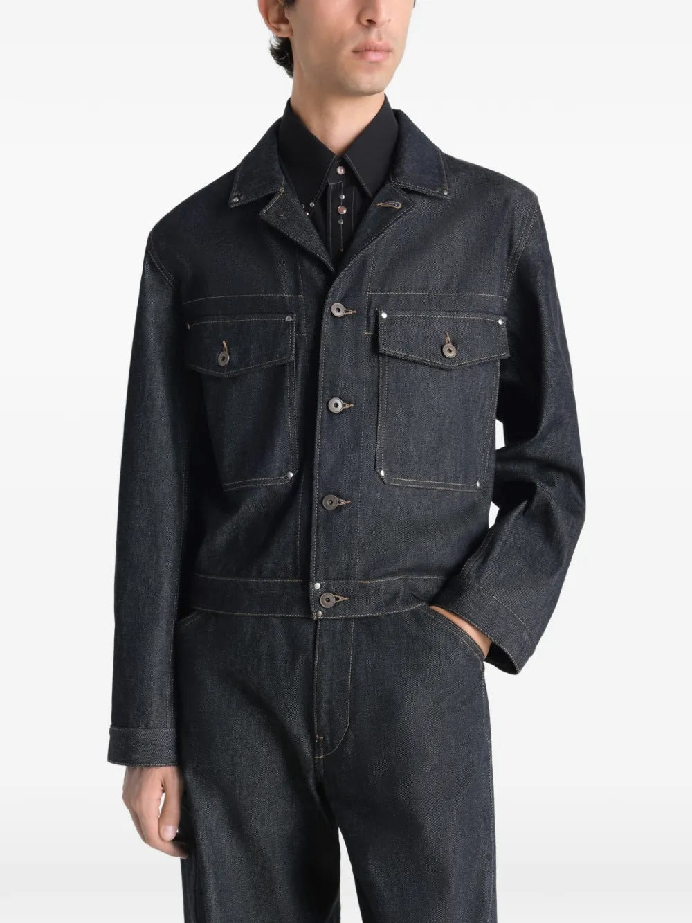 Blue jackets worn by a person, showing the jackets fit