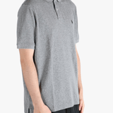 Grey t-shirt worn by a person, showing the t-shirt's fit