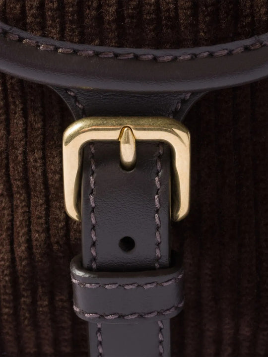 Close up of Brown bags, showing texture of the cotton and leather fabric