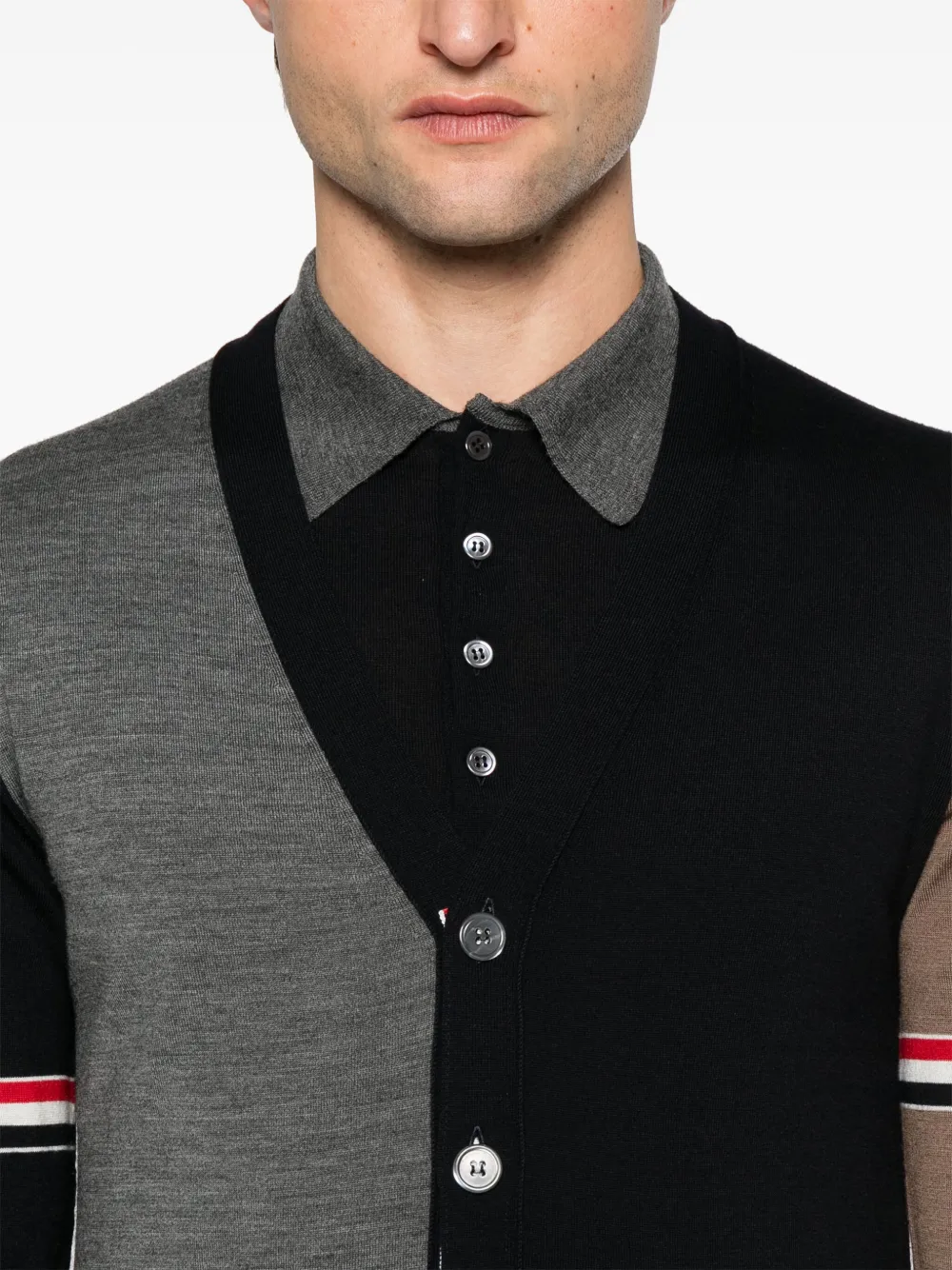 Close up of the blue knitwear, showing texture of the wool fabric