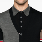 Close up of the blue knitwear, showing texture of the wool fabric