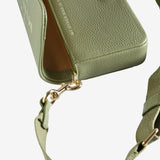 Close up of green bag, showing texture of the leather fabric