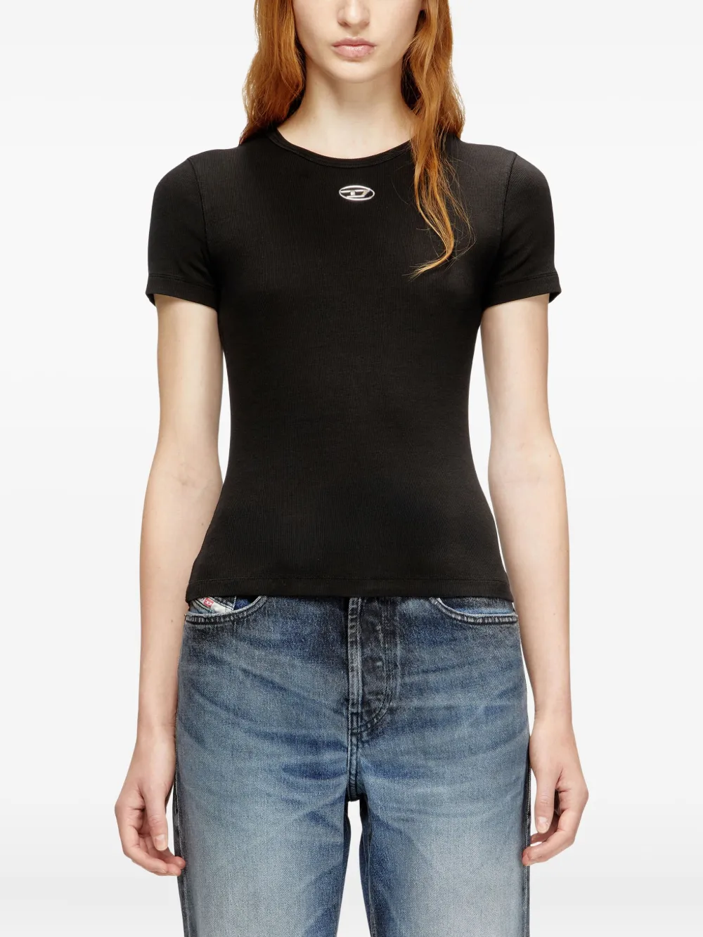 black top worn by a person, showing the top fit