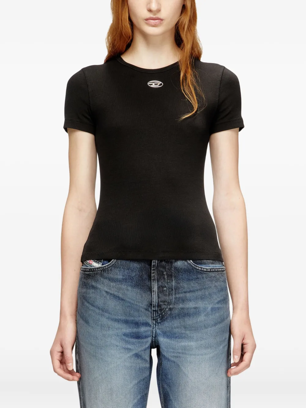 black top worn by a person, showing the top fit