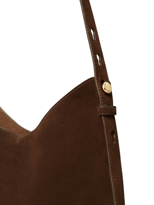 close up of brown bags, showing texture of the suede fabric