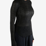 Black topworn by a person, showing the top fit