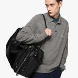 Grey knitwear, side view