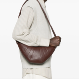 Brown croissant bag, full body view