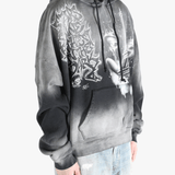 Black hoodies worn by a person, showing the hoodies fit