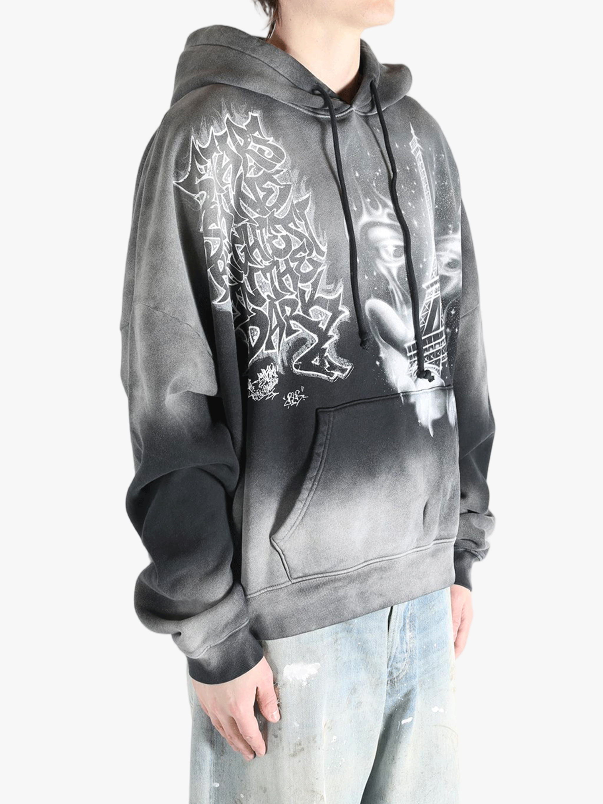 Black hoodies worn by a person, showing the hoodies fit