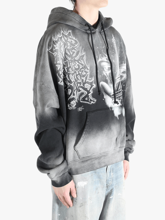 Black hoodies worn by a person, showing the hoodies fit