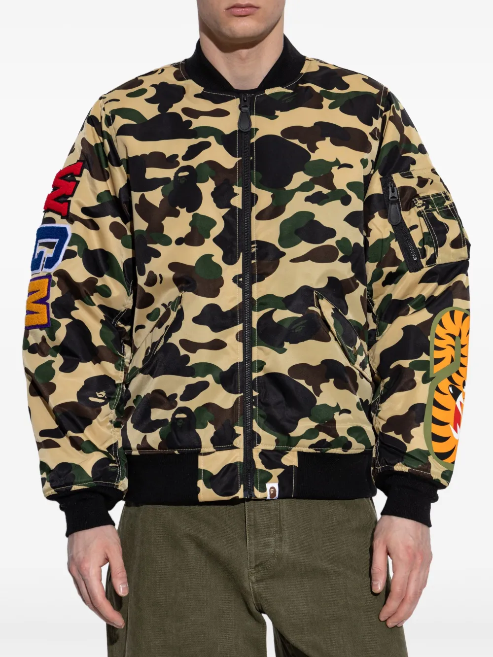 Yellow jackets worn by a person, showing the jackets fit