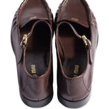 Brown shoes, back view