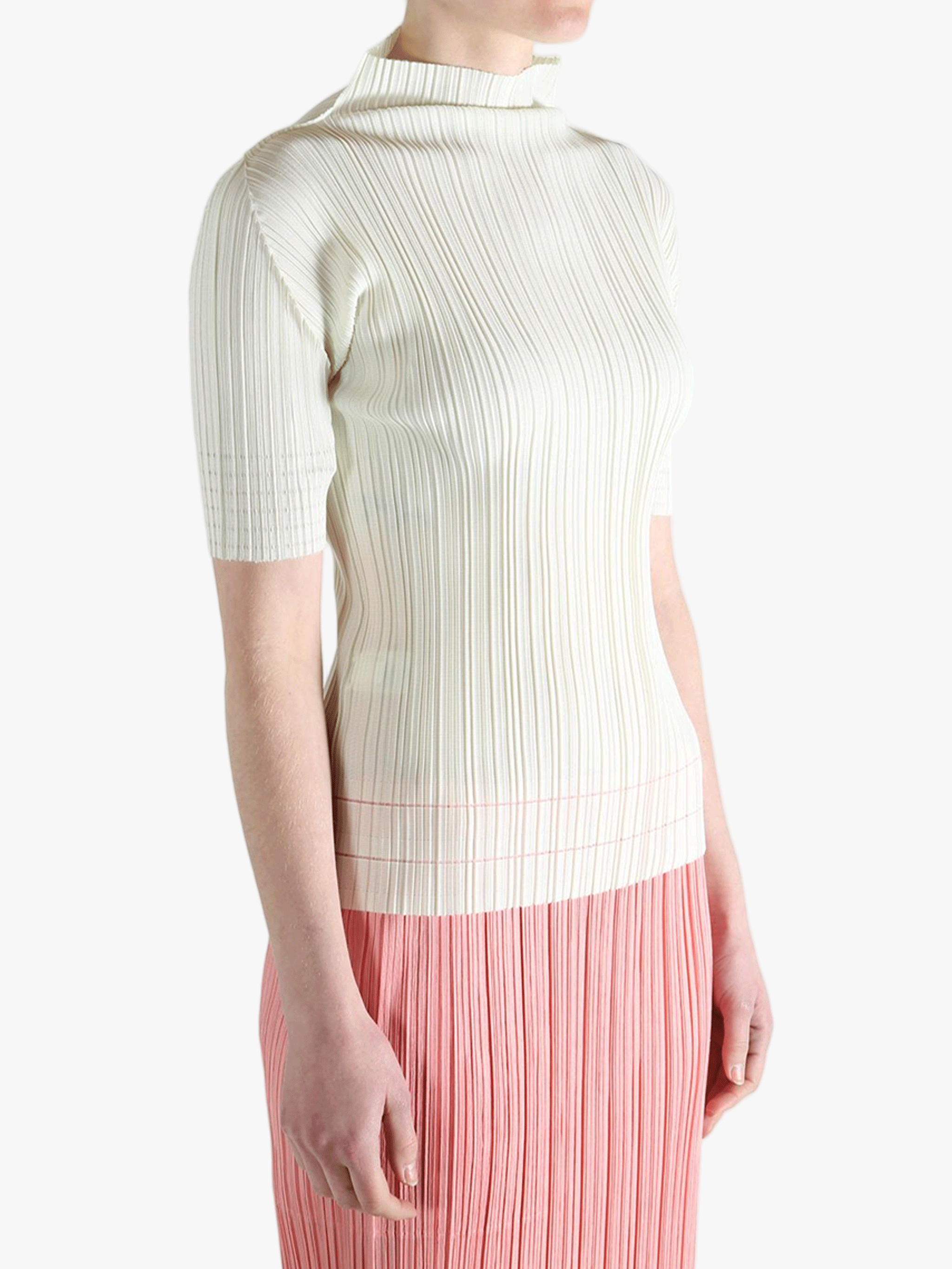 White shirt worn by a person, showing the shirt's fit