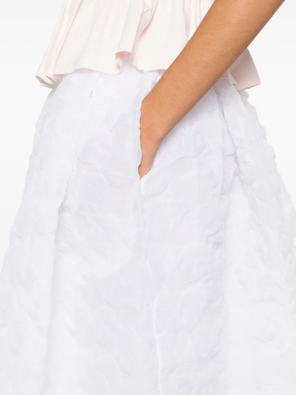 Close up of white skirt, showing texture of the Cupro fabric