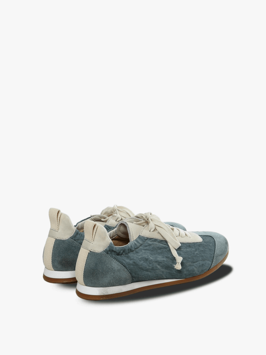 Blue sneakers, side view