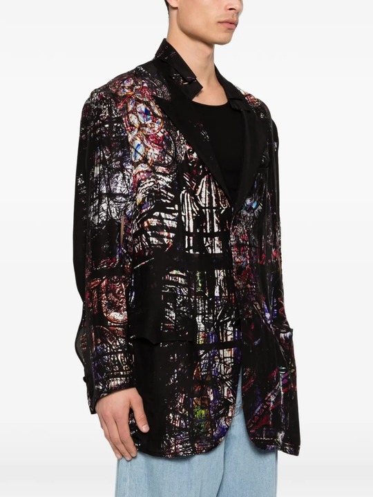 Black jacket worn by a person, showing the jacket's fit