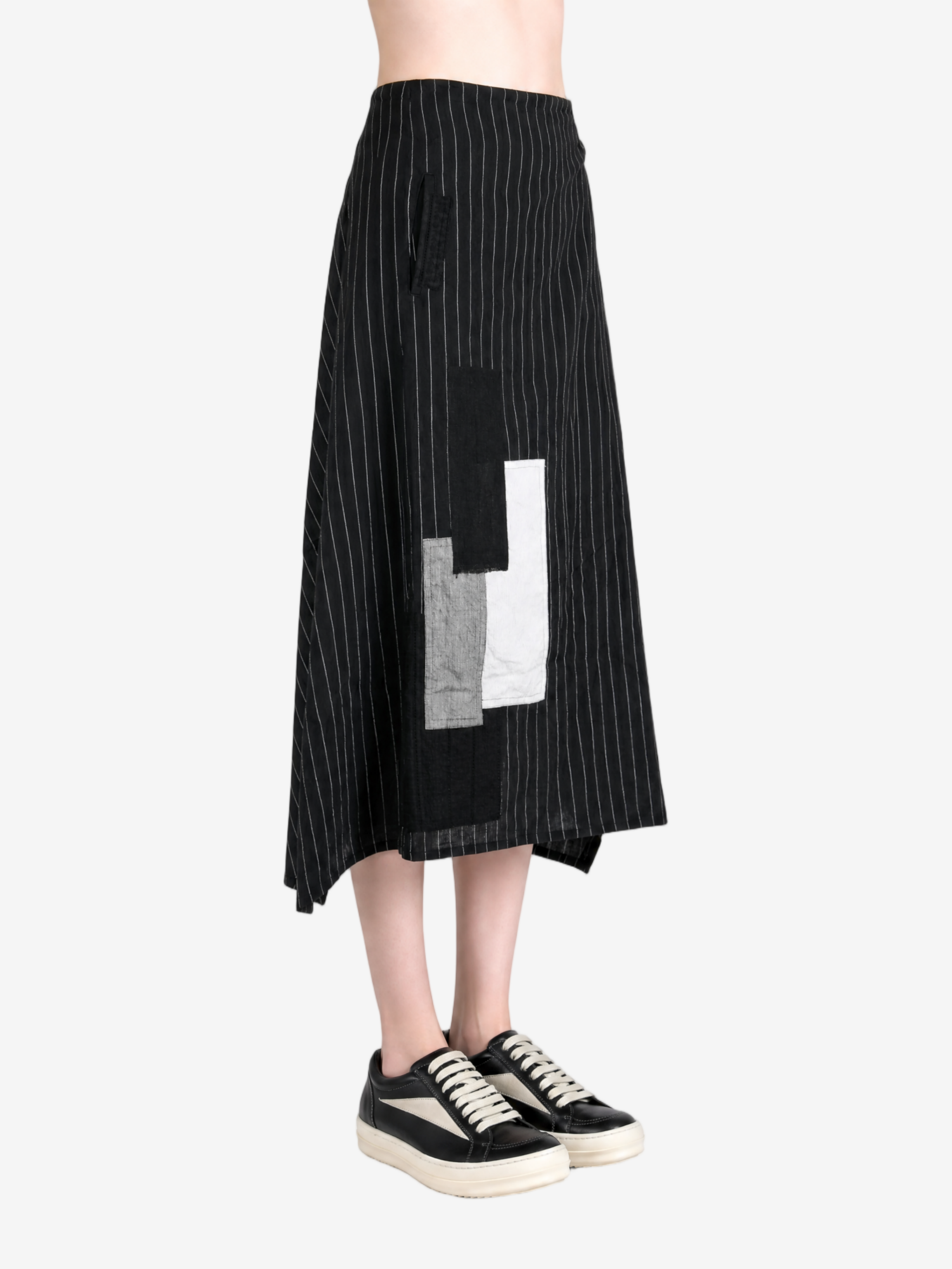 Black skirt worn by a person, showing the skirt fit