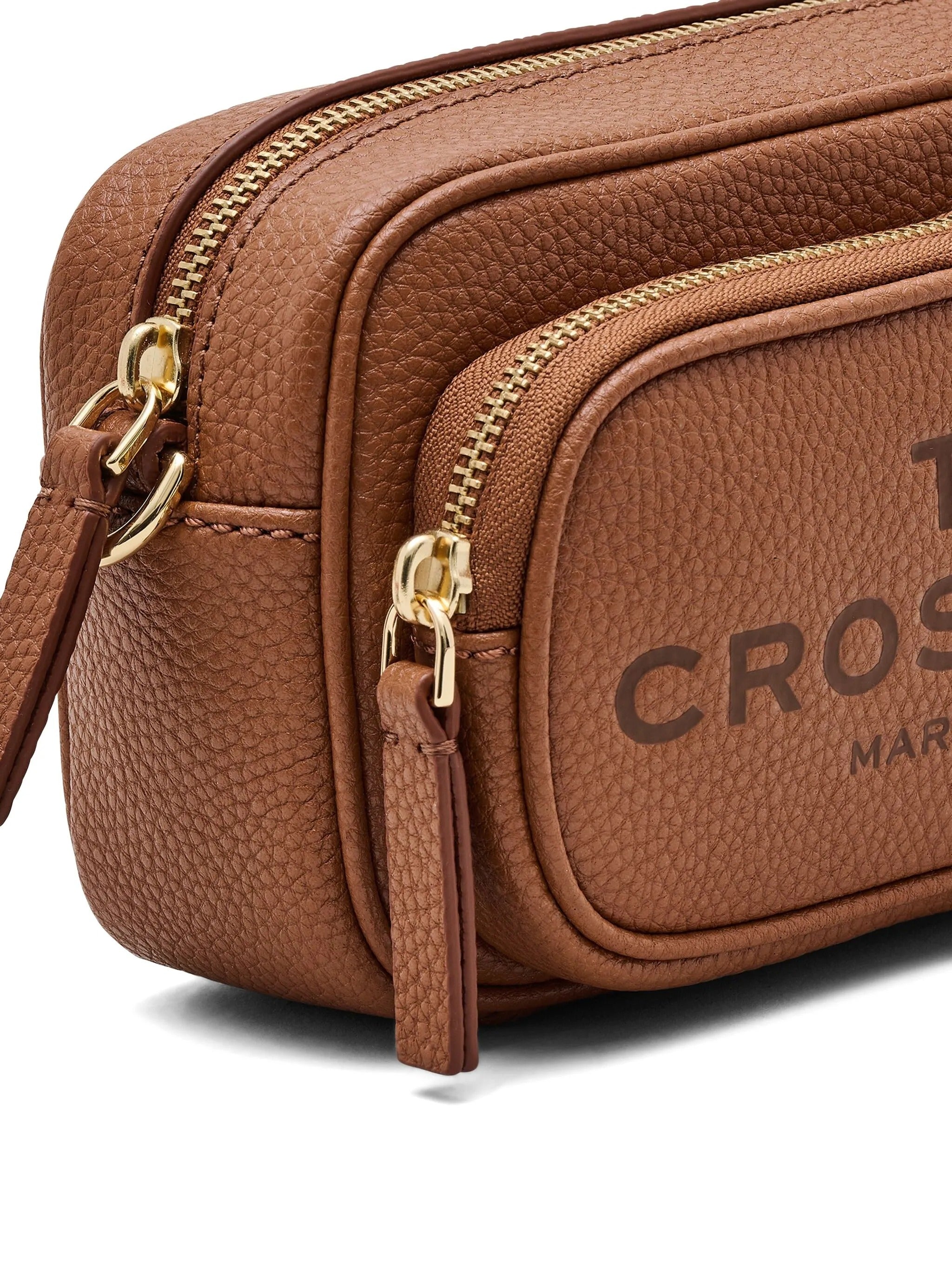 Close up of brown bag, showing texture of the leather fabric