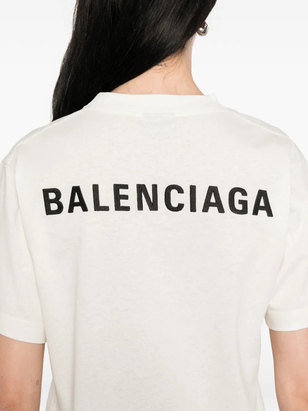 Cloes-up of white T-shirts, showing texture of the cotton fabric